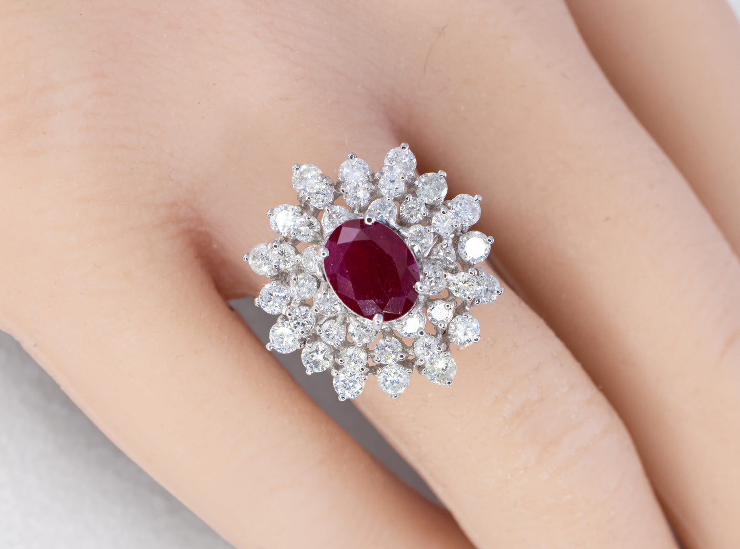 Oval Ruby and Tiered Brilliant-Cut Diamond Starburst Ring