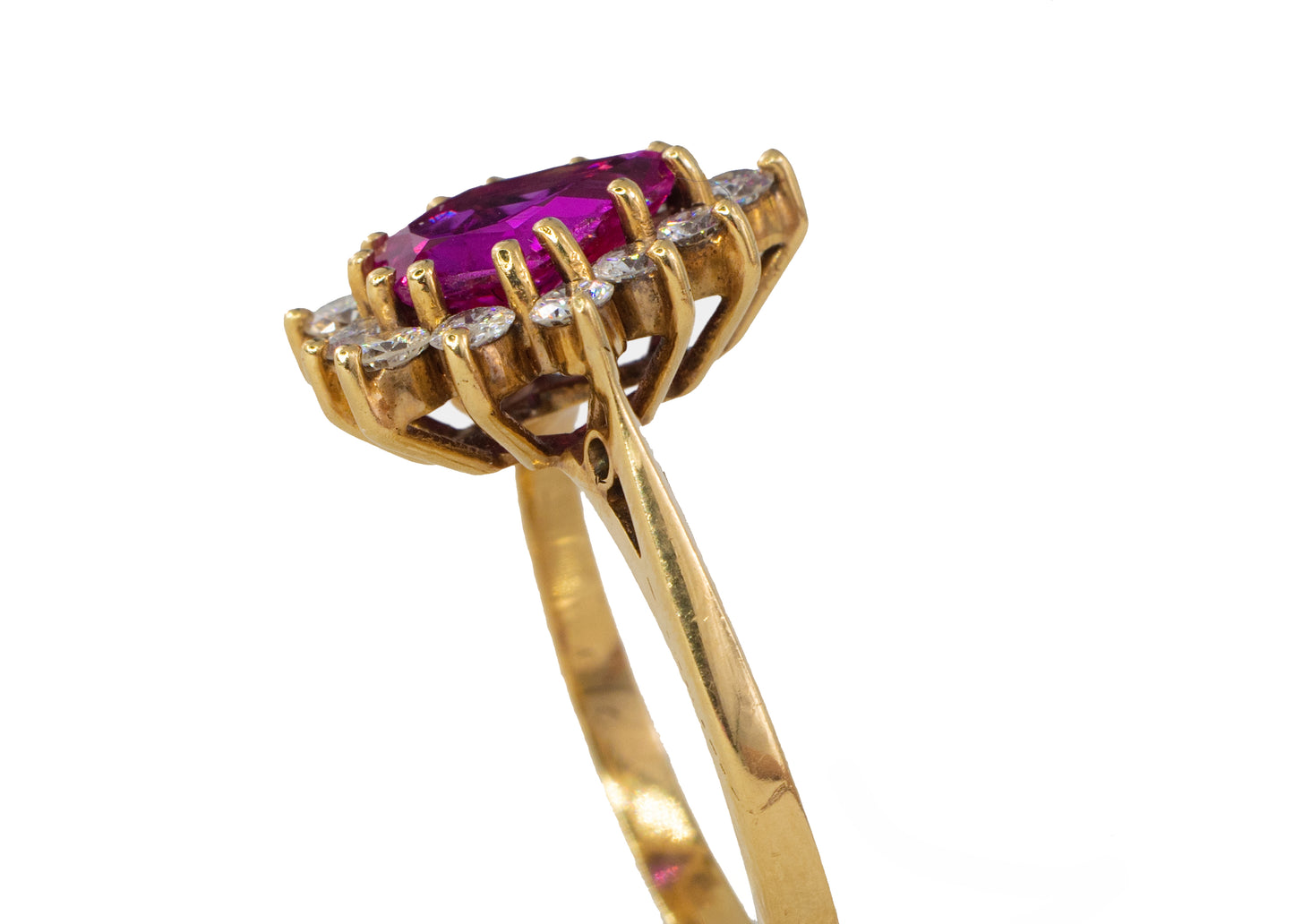 Shield-Cut Ruby and Diamond Starburst Halo Ring