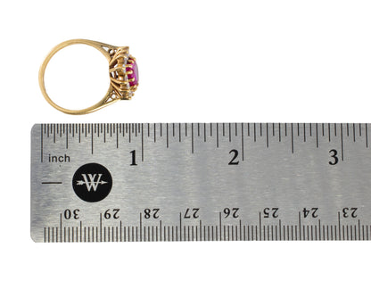 Shield-Cut Ruby and Diamond Starburst Halo Ring