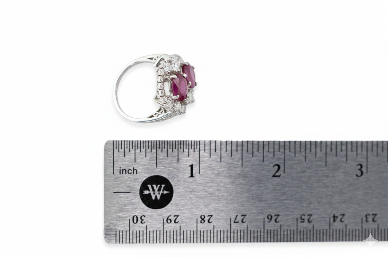 Oval Ruby Bypass Cocktail Ring with Baguette and Round Diamond Accents