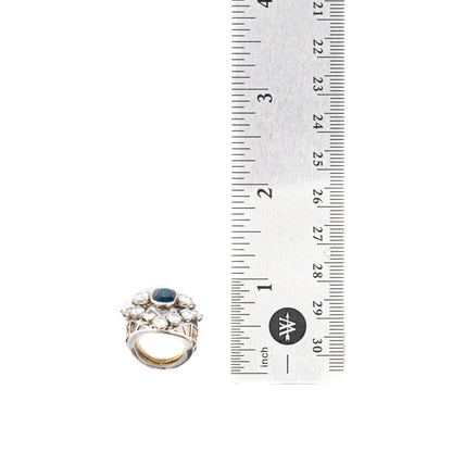 Oval Cut Sapphire and Diamond Dome Ring