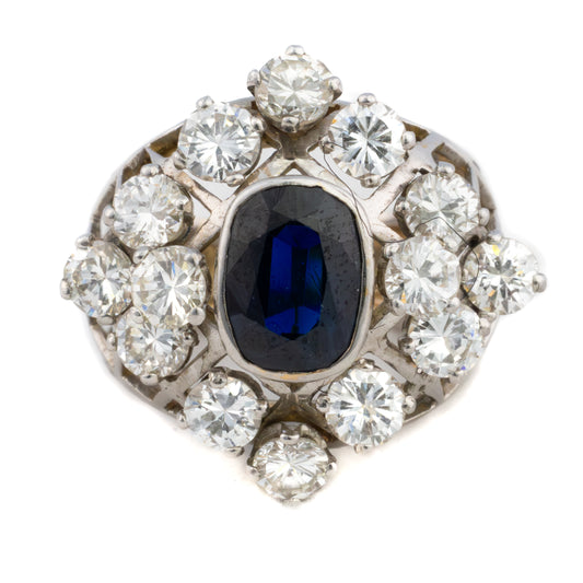 Oval Cut Sapphire and Diamond Dome Ring