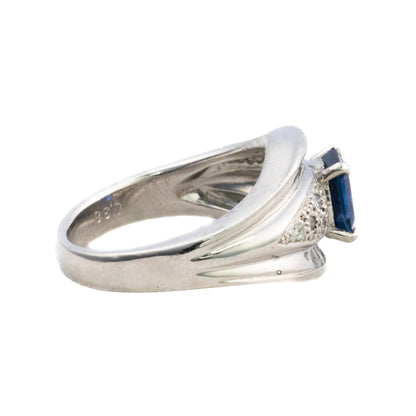 Platinum Emerald Cut Sapphire and Diamond Dome Ring