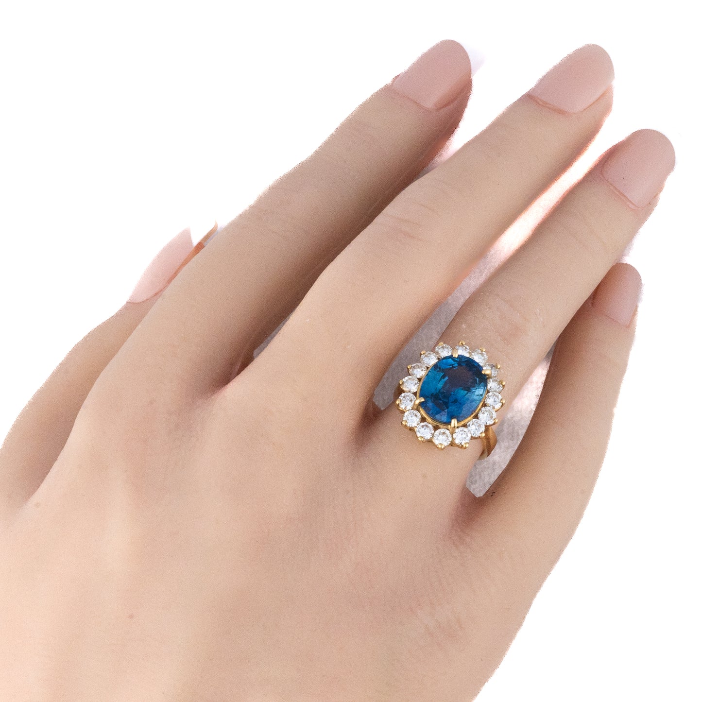 Oval Sapphire and Diamond Halo Ring