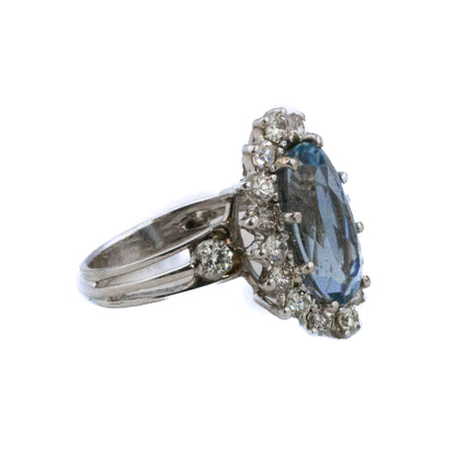 Oval Cut Aquamarine and Brilliant Cut Diamond Halo Ring